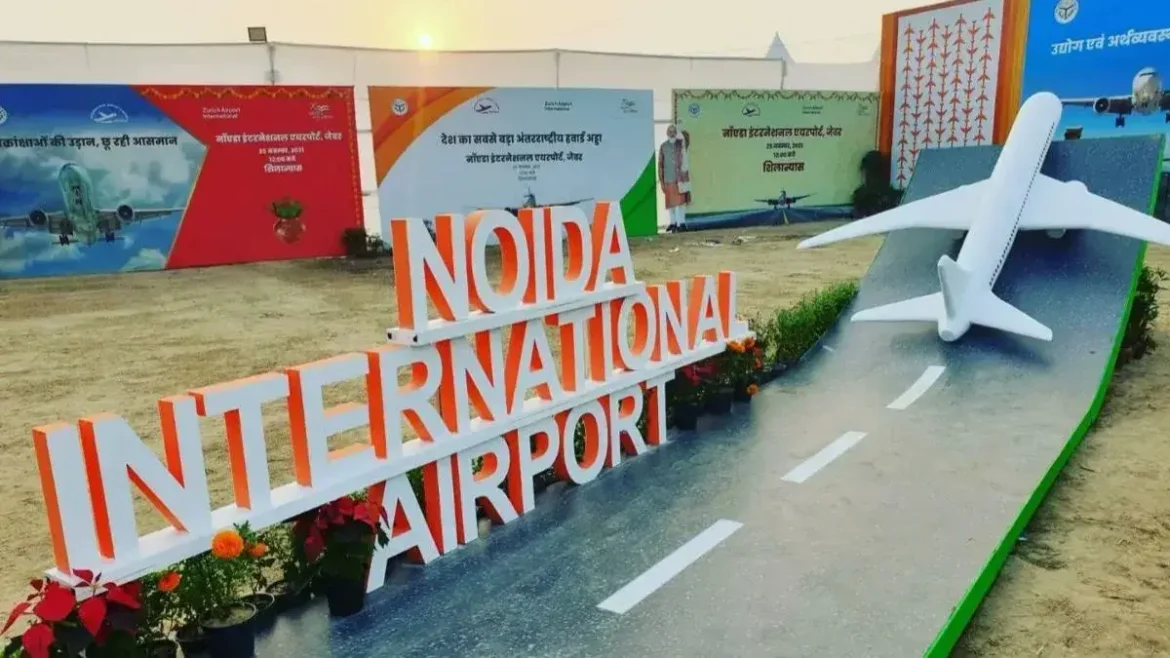 Jewar Airport नोएडा इंटरनेशनल एयरपोर्ट, जेवर 24 साल और 7 सरकारों के बदलावों के बाद बनकर तैयार है। एशिया के सबसे बड़े एयरपोर्ट को अब सिर्फ एयरोड्रम लाइसेंस और प्रधानमंत्री कार्यालय से उद्घाटन की तारीख का इंतजार है। जानें पूरे प्रोजेक्ट का सफर।